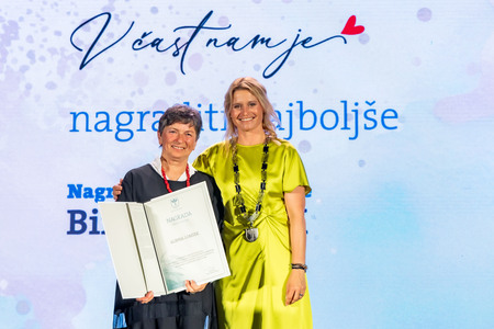 Nagrajenka Binca Lomšek z mag. Renato Kosec; foto: Rok Majhenič